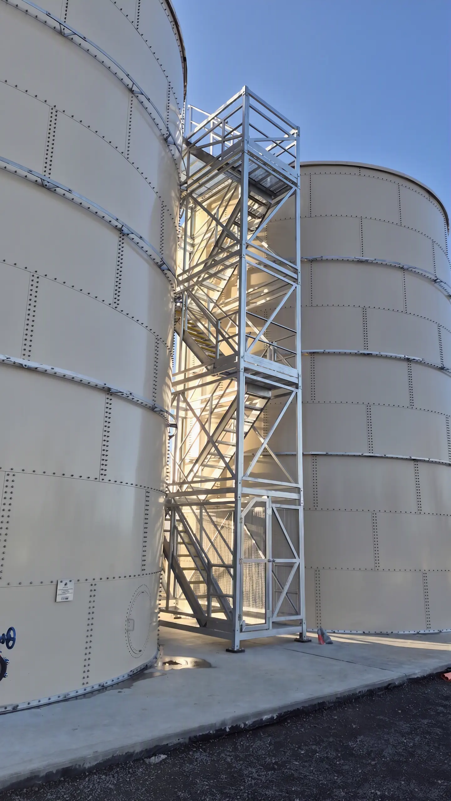 Close-up of galvanised steel inter-tank access stair tower structure