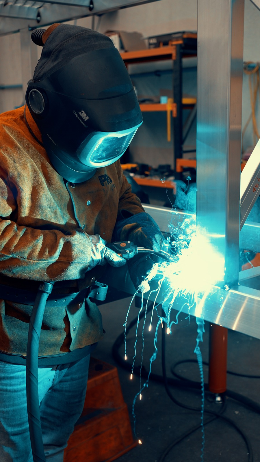 Welder fabricating aluminium access equipment at Star Aluminium facility Carrum Downs Victoria